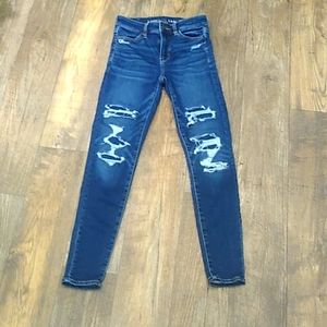 American Eagle distressed blue jeans.  Size 0.